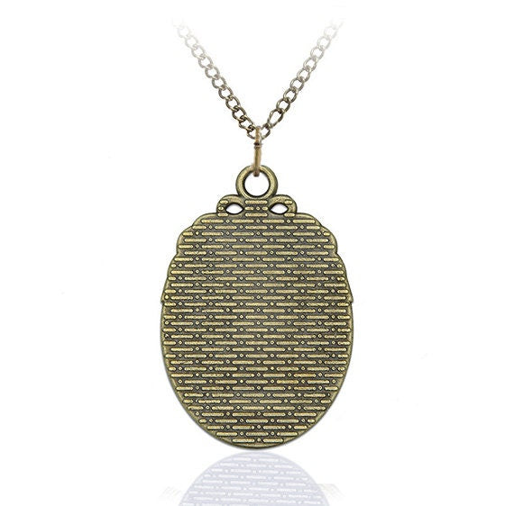 Our Lady of Victory Bronze Necklace Religious Oval Pendant