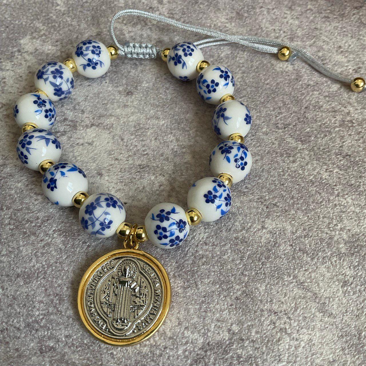 Saint Benedict Pendant Charm Bracelet - Porcelain Beaded Catholic Bracelet, Blue and White Floral Design, Adjustable Cord 18K Gold Plated