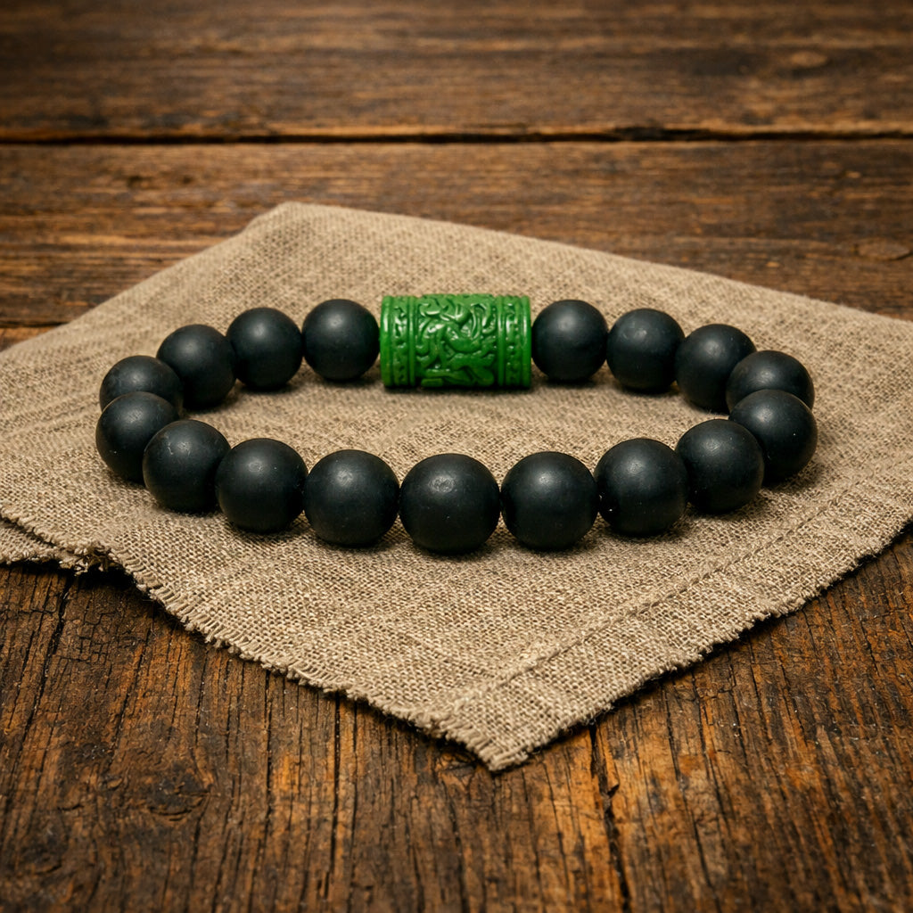 Matte Onyx: Bold Black Stone with a Unique Green Carved Accent