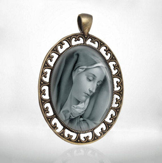 Sorrowful Mother Mary in Black And White Christian Catholic Pendant Oval